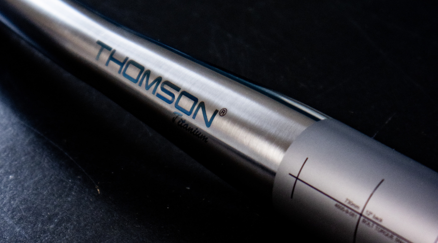 close up image of logo of Thomson Ti handlebar