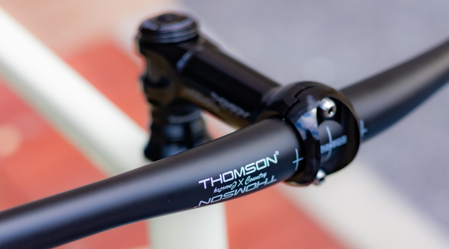 close up image of carbon handlebar on a track