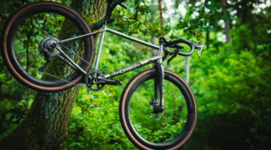 tiitanium bike hanging from a tree